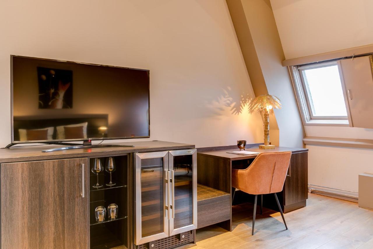 Brasss Hotel Suites Haarlem Eksteriør bilde A room at the hotel