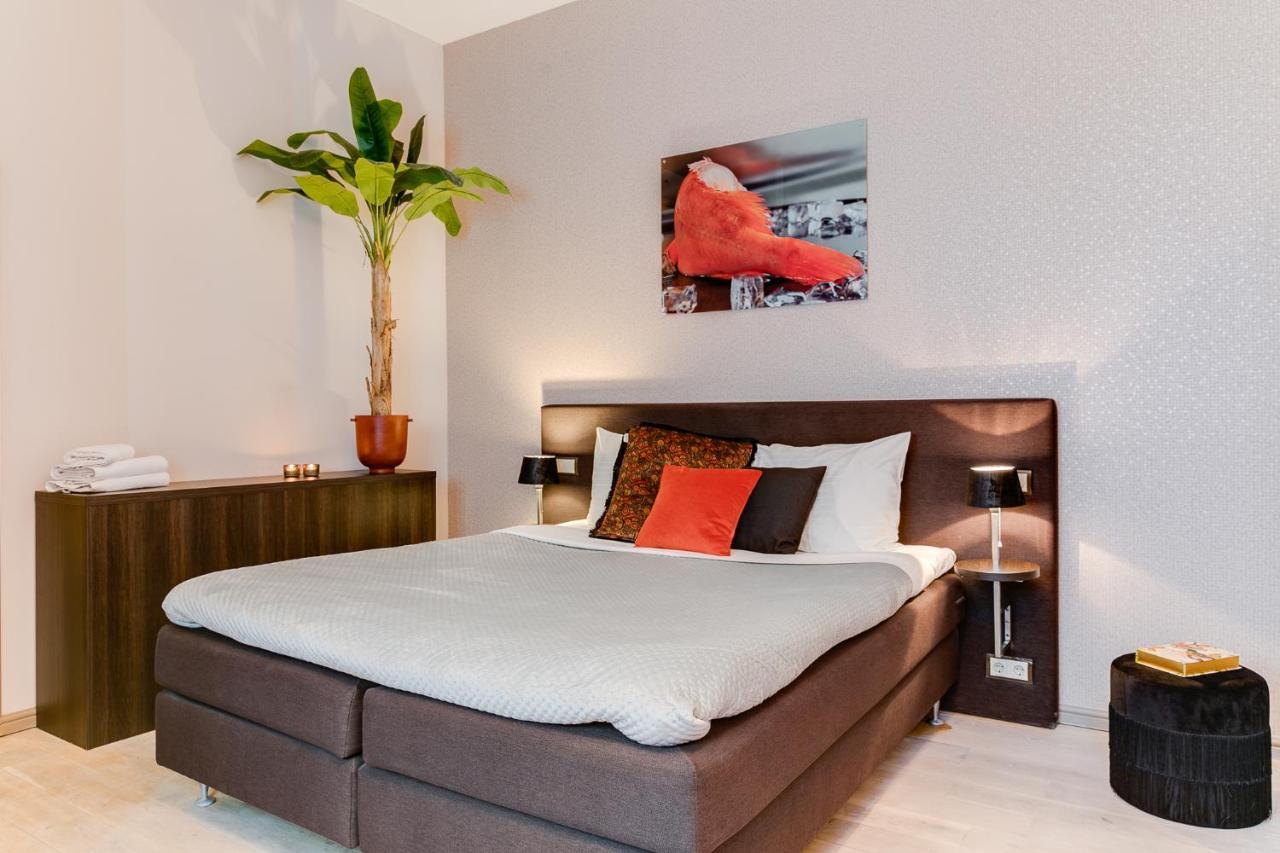 Brasss Hotel Suites Haarlem Eksteriør bilde A bedroom at the hotel